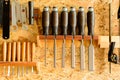 Carving tools hanging on the wall holder Royalty Free Stock Photo