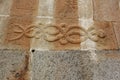 Carving of Twining serpents snakes on the wall of Gomateshwara temple, Vindhyagiri, Shravanbelgola Royalty Free Stock Photo