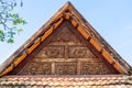 Carving wood gable roof on a resort hotel in India, Alappuzha, Kerala. Wooden roof structure, traditional indian style