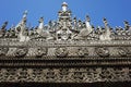 Carvings of Buddhist myths on ancient teak Shwenandaw monastery Golden palace in traditional Burmese architectural style