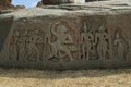 Carvings on the Hemakuta Hill, Hampi, Karnataka. Sacred Center. Hanumana in the centre, Lord Rama, Lakshmana and Sita on the right Royalty Free Stock Photo