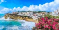 Carvoeiro town with colorful houses and yellow sand beach