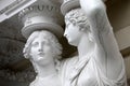 Caryatid. Statues of two young women in Vienna Royalty Free Stock Photo