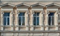 Caryatids on an old building facade