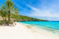 Cas Abao beach - paradise white sand Beach with blue sky and crystal clear blue water in Curacao, Netherlands Antilles, a
