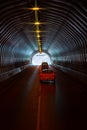 Cas are in long road tunnel Royalty Free Stock Photo