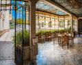 Casa Alegre de Sagrera museum back saloon with chairs, access to the exterior patio modernist style