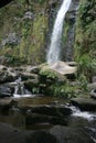 Cascada Taxopamba waterfall leading to water flowing over rocks into a pool Otavalo Ecuador Royalty Free Stock Photo