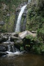 Cascada Taxopamba waterfall leading into stream flowing into a pool Otavalo Ecuador Royalty Free Stock Photo