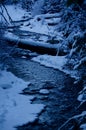 Cascade Mountain Blue Hour: Flocked Branches and Flowing Water Royalty Free Stock Photo