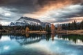 Cascade ponds with mount rundle and wooden bridge in autumn forest at Banff national park