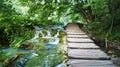 Cascade waterfalls and wooden pathway over the water, Plitvice Lakes in Croatia, National Park Royalty Free Stock Photo