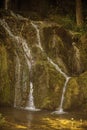 Cascades of little waterfall on the rocks wall Royalty Free Stock Photo