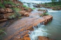 Cascades at the top of spectacular double drop unamed waterfall in the Cockburn Ranges, El Questro Resort, Kimberley, Western