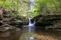 Cascading Beauty: A Small Pennsylvania Waterfall Split by a Majestic Rock