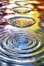 Cascading layers of soft liquid gradients create rhythmic waves in vibrant colors. interplay of light and water evokes sense