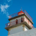 Tourists high up on the observation point at Santa Marta lighthouse in Cascais, Lisbon, Portugal