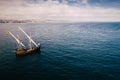 Cascais, Portugal - June 1st, 2022: Aerial view of Vera Cruz Portuguese caravel replica at Cascais Bay, Portugal