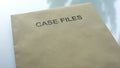 Case files, folder with important documents lying on table, information close up Royalty Free Stock Photo