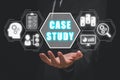 Businessman hand holding case study icon on virtual screen Royalty Free Stock Photo