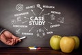 Case study concept. Chart with keywords and icons. Apples and chalkboard background Royalty Free Stock Photo