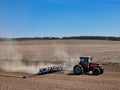 Case 7240 tractor pulling a .Kinze 3205 12 row planter planting corn Royalty Free Stock Photo