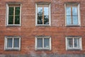 Casement windows in red brick wall Royalty Free Stock Photo