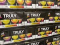 Cases of cans of Truly Flavored Hard Lemonades at a Sams Club grocery store waiting for customers to purchase