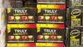 Cases of cans of Truly Flavored Hard Lemonades at a Sams Club grocery store waiting for customers to purchase