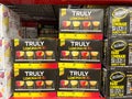 Cases of cans of Truly Flavored Hard Lemonades at a Sams Club grocery store waiting for customers to purchase