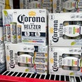 Cases of Corona Hard Seltzer Spiked Sparkling water alcohol beverages at a Sams Club store