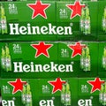 Cases of Heineken Bottle Beer at a grocery store waiting for customers to purchase. Heineken is a product of Holland