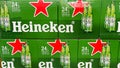 Cases of Heineken Bottle Beer at a grocery store waiting for customers to purchase. Heineken is a product of Holland