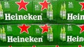 Cases of Heineken Bottle Beer at a grocery store waiting for customers to purchase. Heineken is a product of Holland