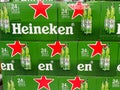 Cases of Heineken Bottle Beer at a grocery store waiting for customers to purchase. Heineken is a product of Holland