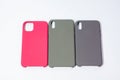 Cases for smartphones in different colors on a white background.