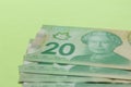 Cash bills from Canadian currency. Dollars. Bills on colorful br