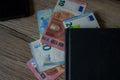 Cash in the book, several banknotes