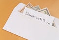 Cash Donations in Envelope Royalty Free Stock Photo