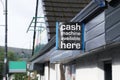 Cash machine here free withdrawals machine sign on wall Royalty Free Stock Photo