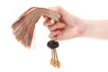 Cash money and house keys in hand Royalty Free Stock Photo