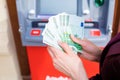 Cash out money at an ATM Royalty Free Stock Photo