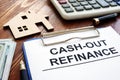 Cash out refinance documents and model of house
