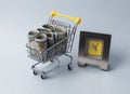 Cash in shopping cart with clocks. Time is money concept