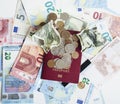 Cash on table isolated: dollars, euro, rubl broken money. All in mess, global crisis . passport travel concept Royalty Free Stock Photo