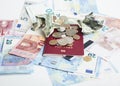 Cash on table isolated: dollars, euro, rubl broken money. All in mess, global crisis . passport travel concept Royalty Free Stock Photo