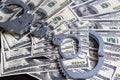 Cash in US Dollars, Real Handcuffs. The Concept of Arrest, Corruption, Bail, Crime, Bribery or Fraud
