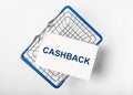 Cashback word on white paper in shopping basket