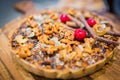 Cashew nut and caramel syrup on chocolate tart cake Royalty Free Stock Photo