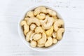 Cashew nuts cashews from above bowl wooden board